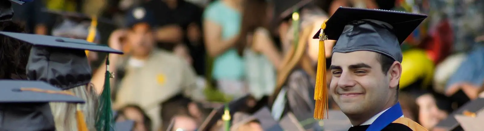 man wearing graduation cap