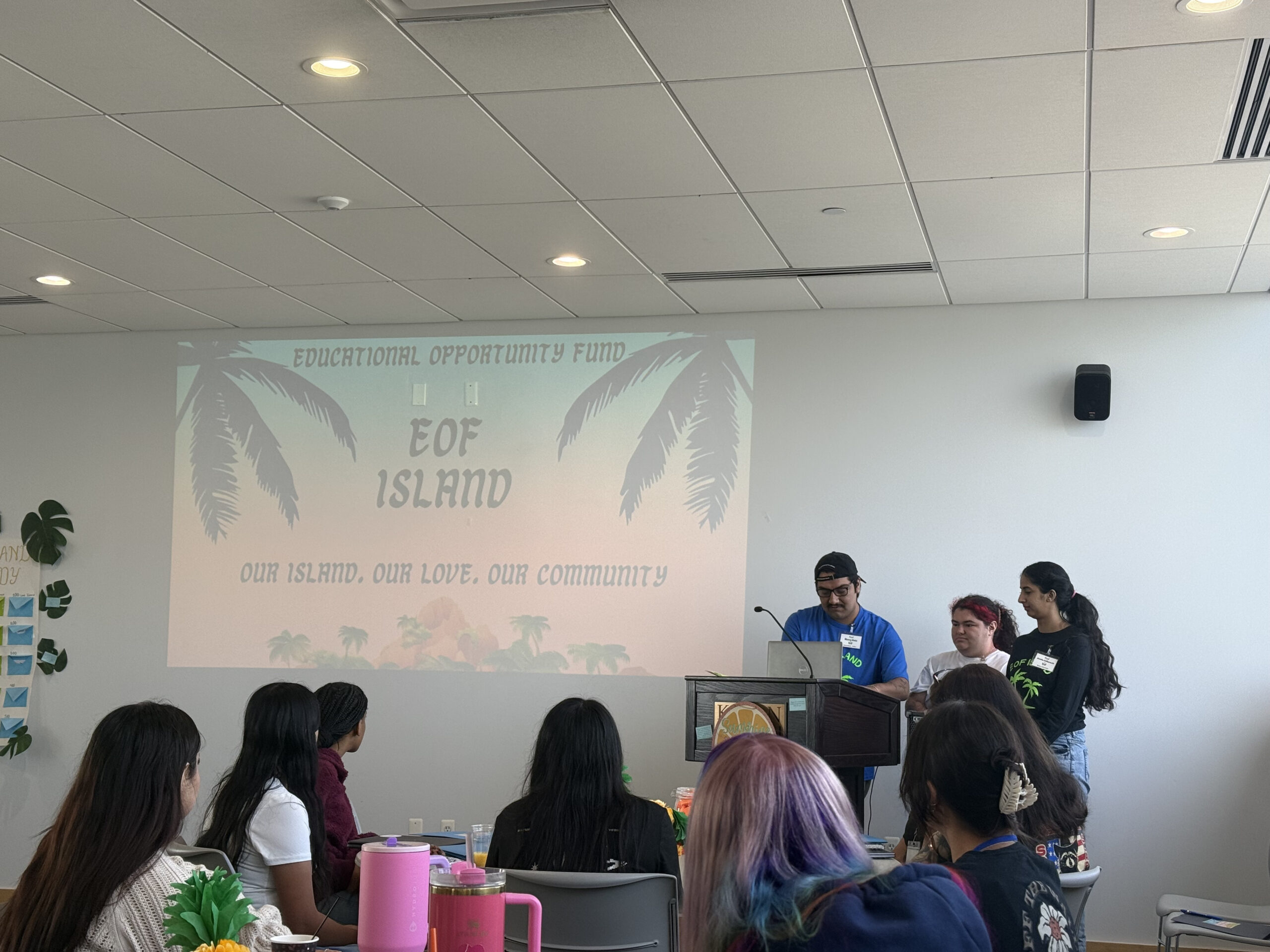 EOF student leaders presenting in front of group of students